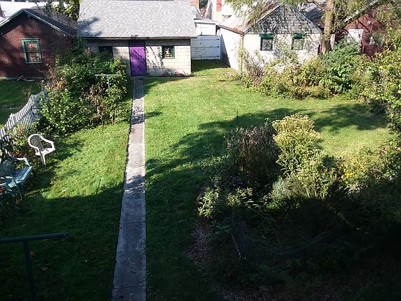 Back Yard & 2 Garages
