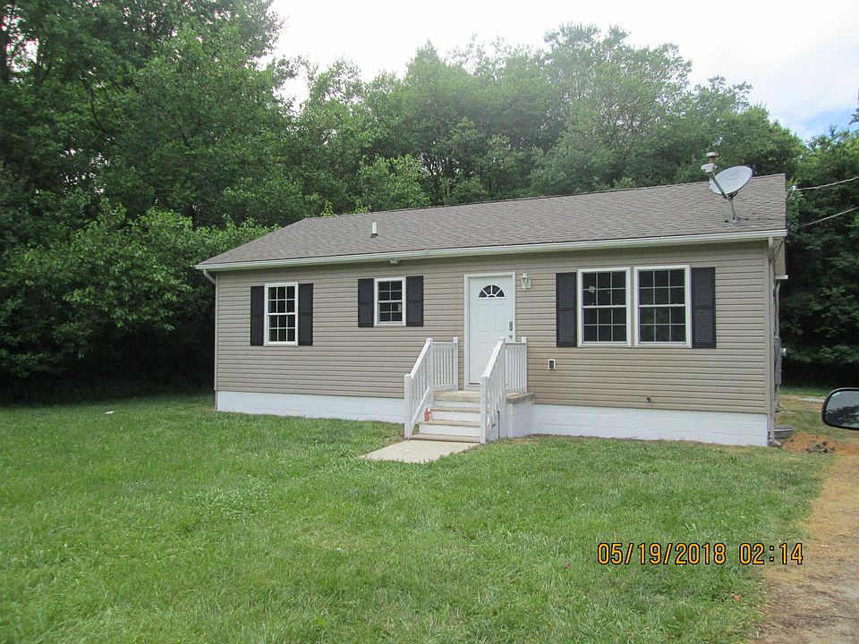 spacious grassy front yard