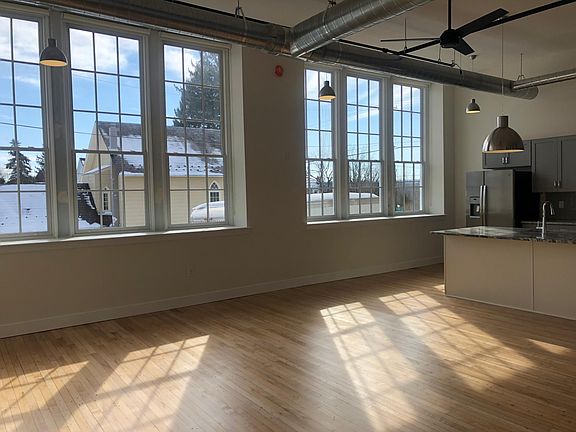 Large windows allow for ample natural light.