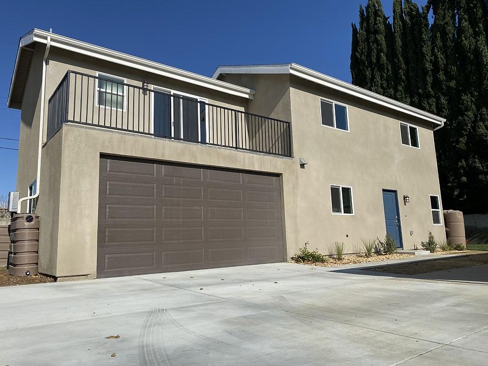 Front of the house + Driveway