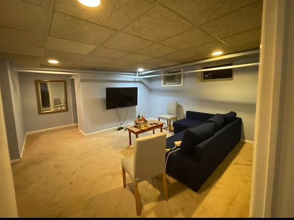 living room- center of space open to kitchenette - furniture not included