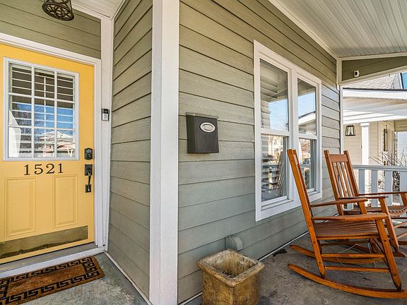 Enjoy a cozy outdoor front porch on a beautiful day!