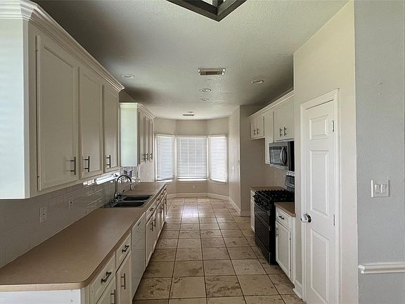 2nd image of 2402 Raintree Village Dr