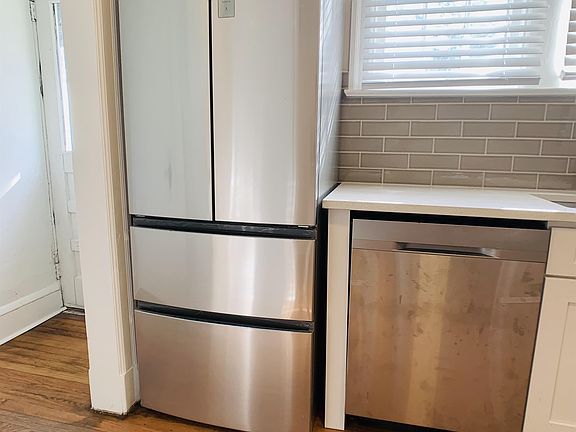 New stainless steel refrigerator and Samsung dishwasher
