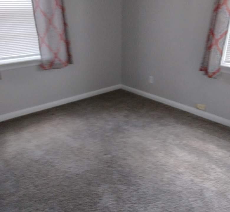 Bedroom with new carpet