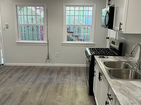 2nd image of 6413 S Van Ness Ave #1/2