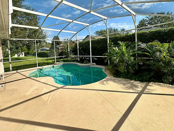 Outdoor pool and pool enclosure - deck view