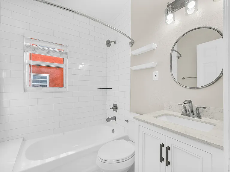 brand new renovated bathroom with large recessed medicine cabinet