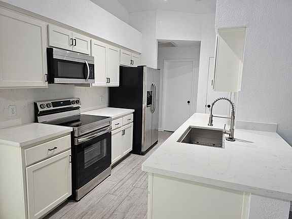 3rd image of 7283 E 36th Pl
