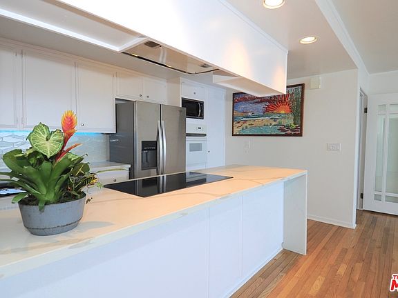 5th image of 11914 Beach Club Way #A