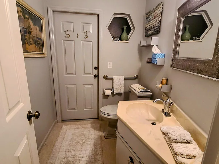 Second half bath with shower outside the door!