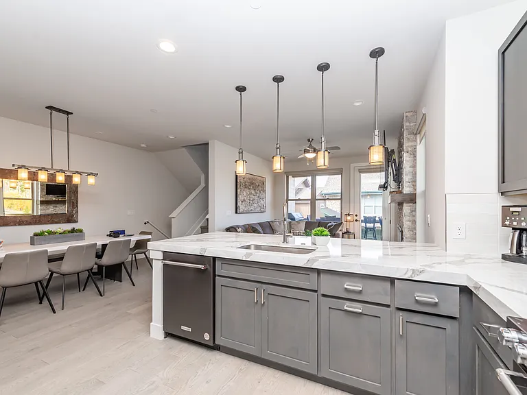 Spacious kitchen with abundant cabinetry, a convenient pantry, and a built-in lazy Susan for effortless organization and storage.