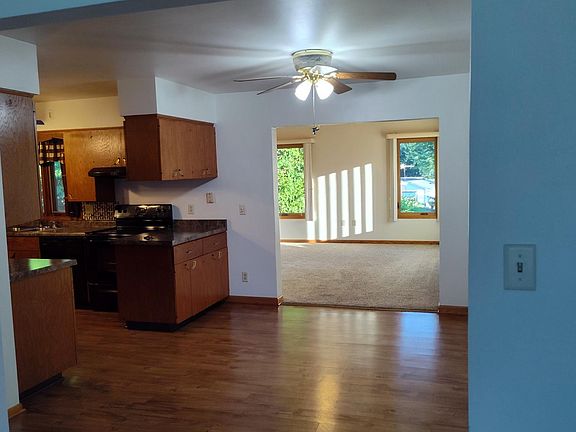 Looking from living room through dinning room into sunroom