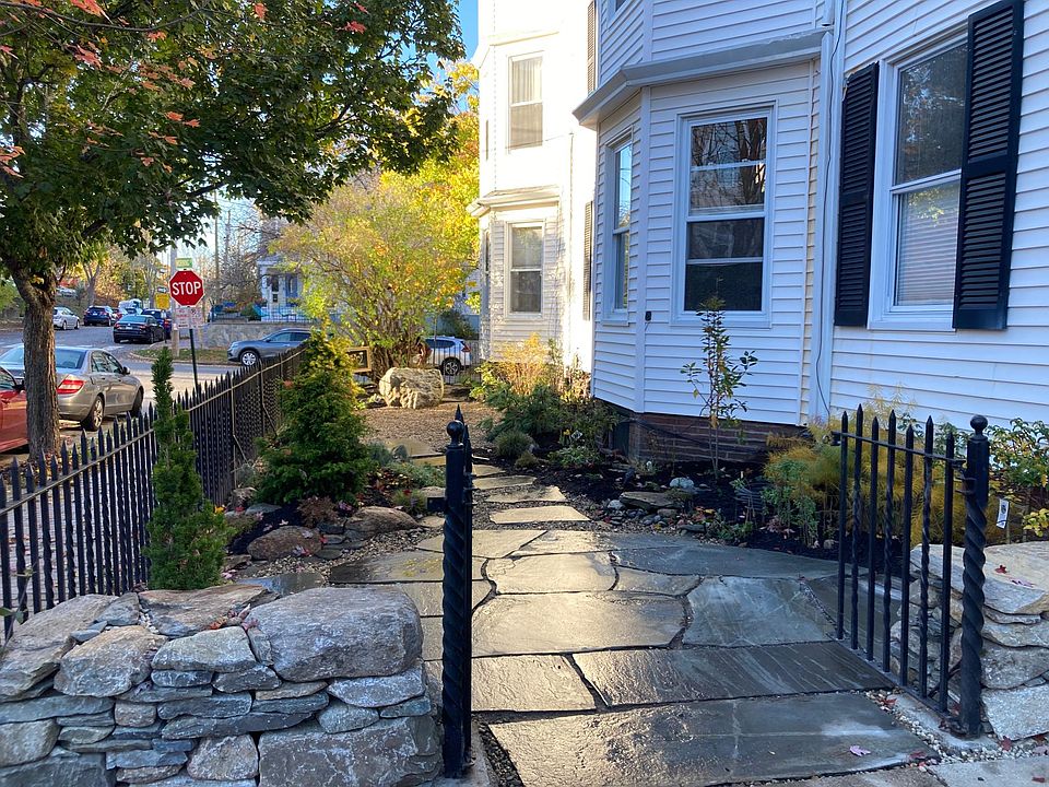 Newly finished hardscape patio. Great for morning coffee and evening libations. New shrubbery and flowers to attract pollinators. Tenant must supply chairs if desired.