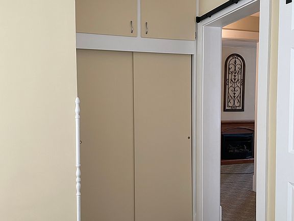 Closet in smaller bedroom.