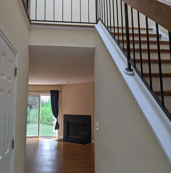 Foyer with Powder Room on left
