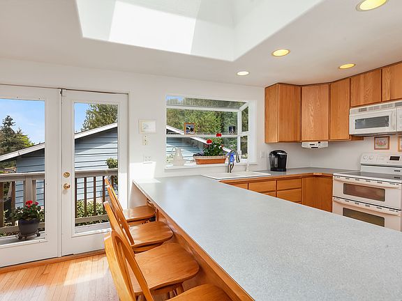 Glass double-doors to your wrap-around deck