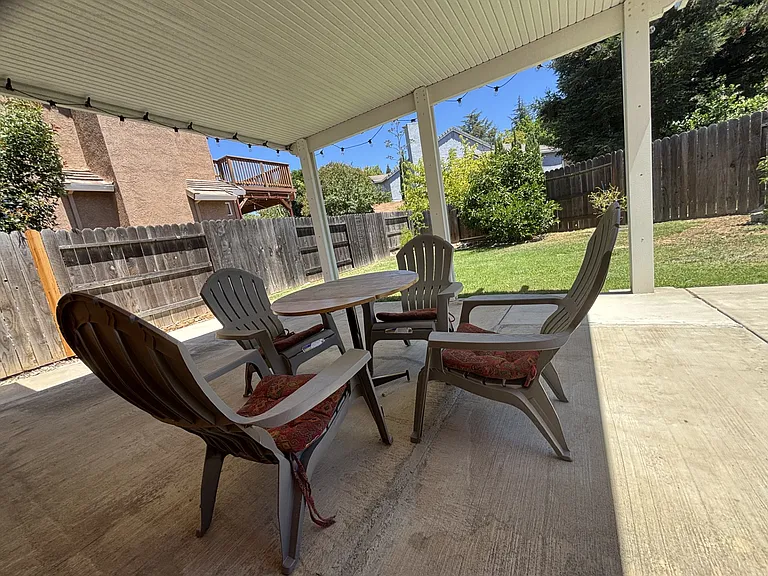 Big backyard with fruit trees for relaxation. Fully fenced for more privacy