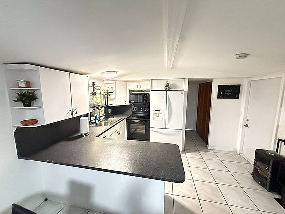 5th image of 11201 SW 55th St Unit L18