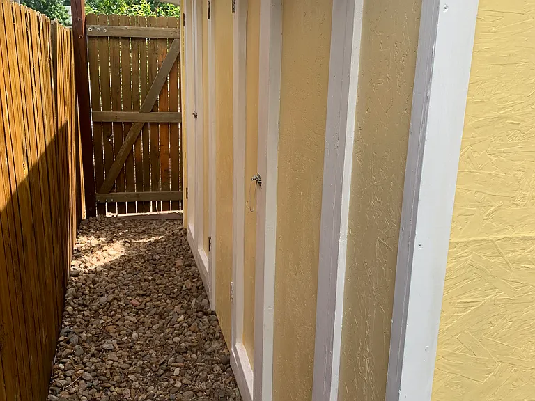 Outdoor shed for tools and equipment; 2'deep x 8'long x 7'high