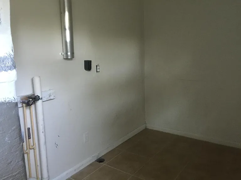 Utility room with W/D hook ups