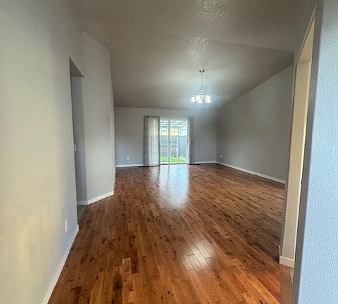 standing in entry and looking thru living room