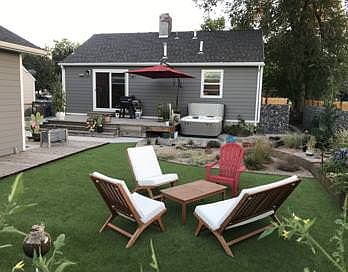 hot tub and finished backyard