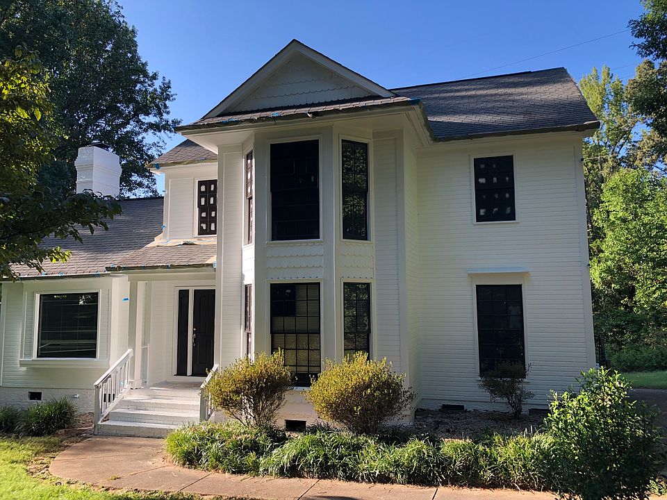 NEW FRESHLY PAINTED FRONT OF HOUSE