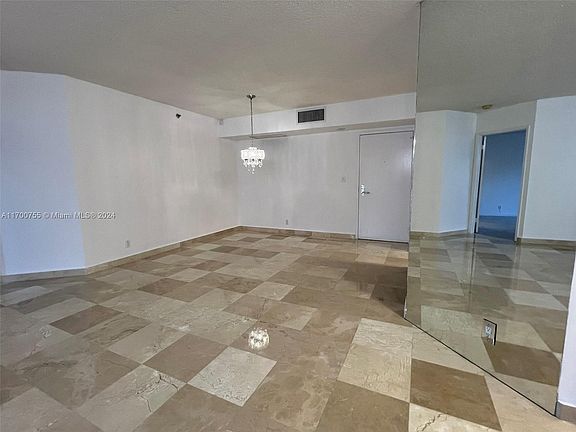 4th image of 3600 Mystic Pointe Dr APT 214