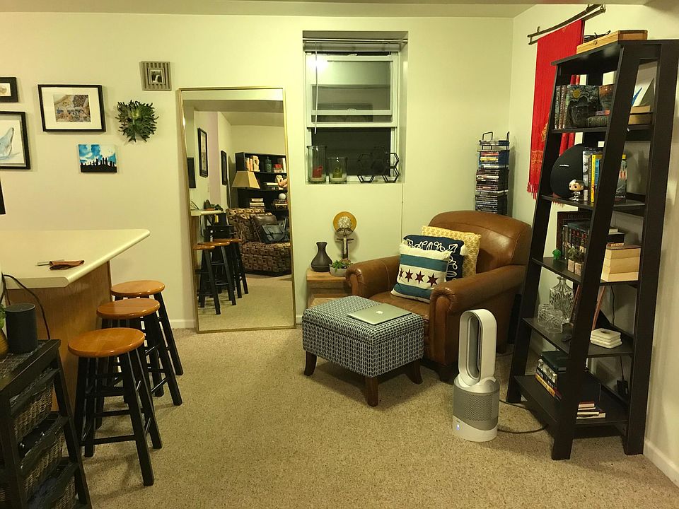 West half of living/dining room at night. (Sorry about the tenant's mirror.)
