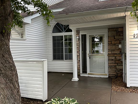 Front entry with patio area for plants or small table and chairs