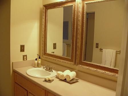 Room bath with extra storage and laundry area