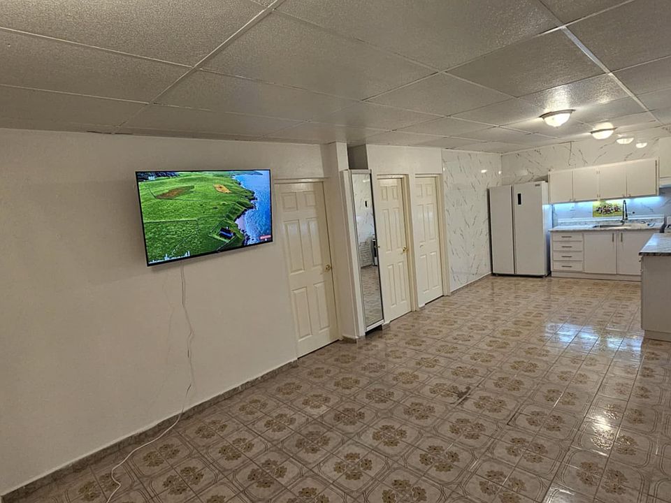 Living room, 55" Smart Roku TV, Liberty Cable TV