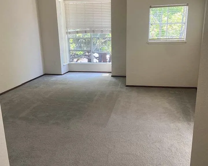 master bedroom over looking trees and freshly painted