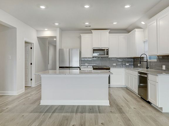 The kitchen has a convenient island.