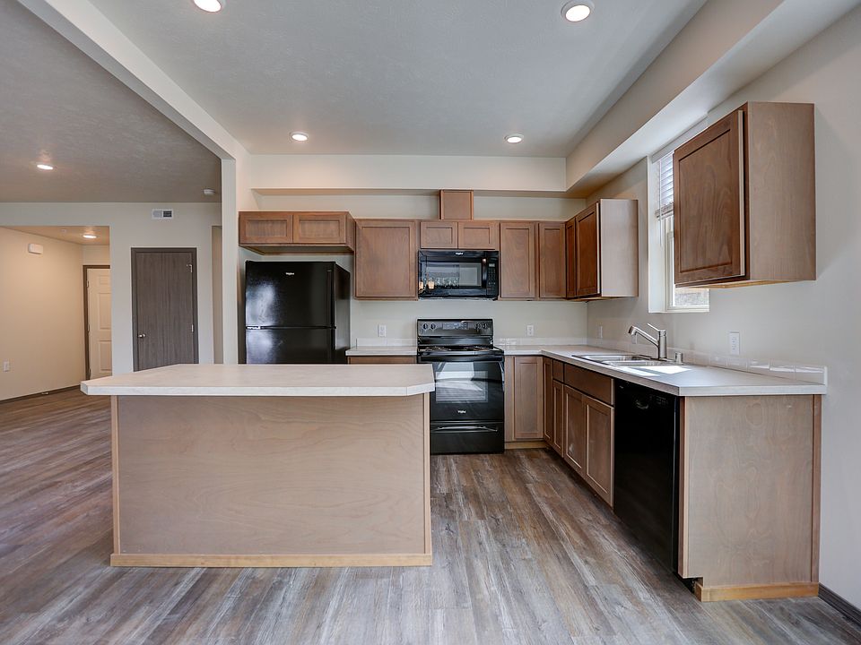 Large spacious kitchen with an island you can sit at