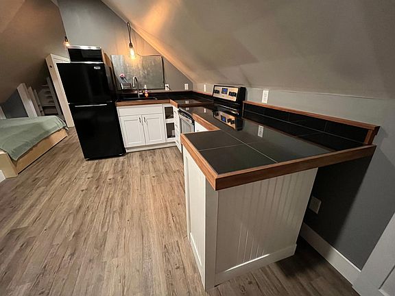 Black slate countertops with red cedar trim