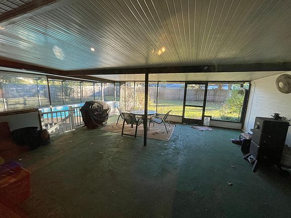 screened patio and pool