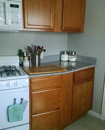 Gas stove, built in microwave, and lots of kitchen storage.