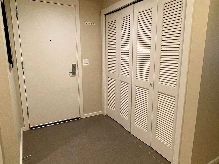 Extra storage in entry. You also get a 5x5x10 foot storage locker in the building for all your bulk storage needs.
