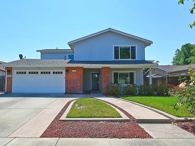 Front of House with 2 car garage