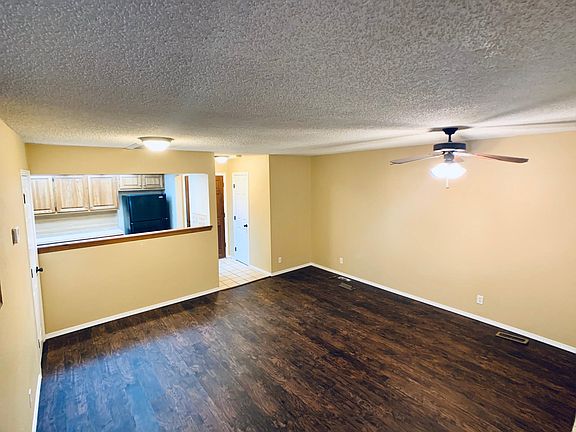 Living room looking toward kitchen