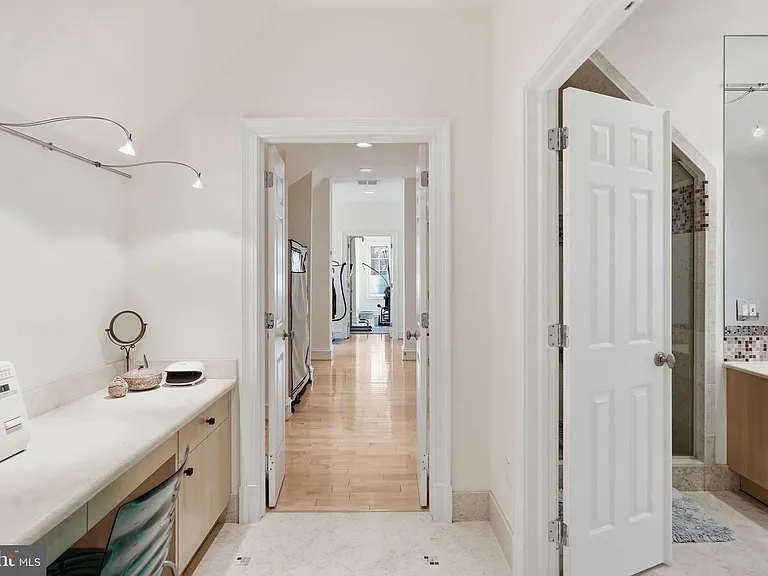 Dressing area off primary baths.
