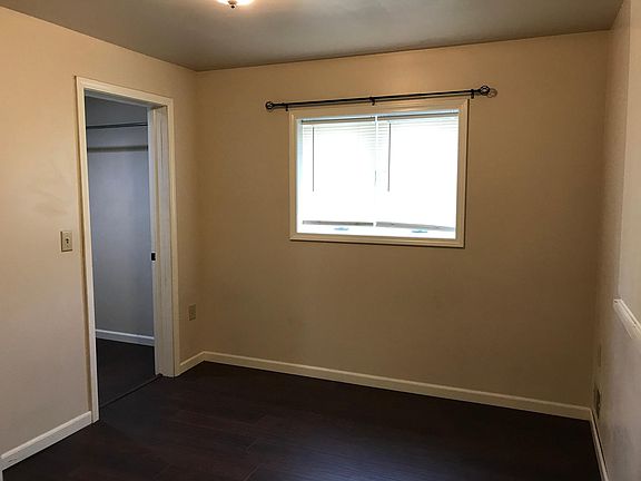 Primary bedroom with walk-in closet