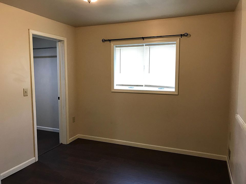 Primary bedroom with walk-in closet