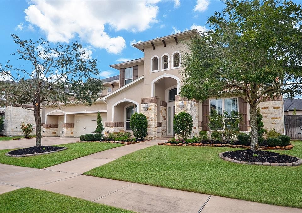 Beautiful stone and stucco 2 story home, on a quiet street with a cul de sac, 3 car garage with updated landscape.