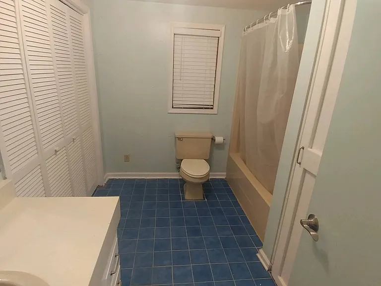 Ground floor full bath with laundry closet