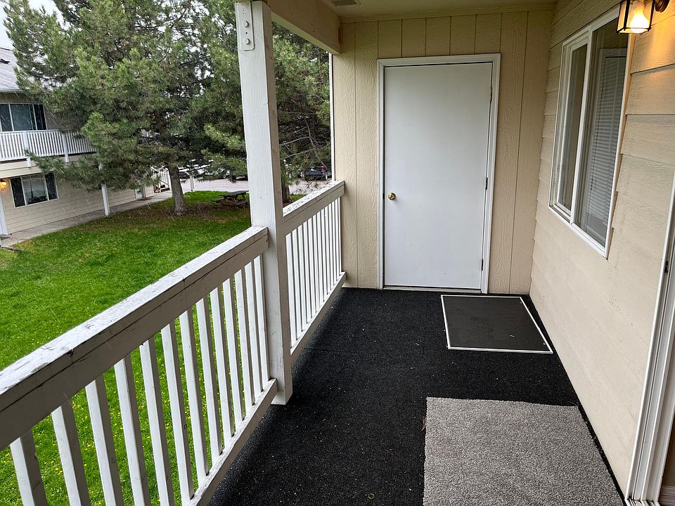 Comfortable private balcony with extra storage (#204), Lower level units have a covered patio.