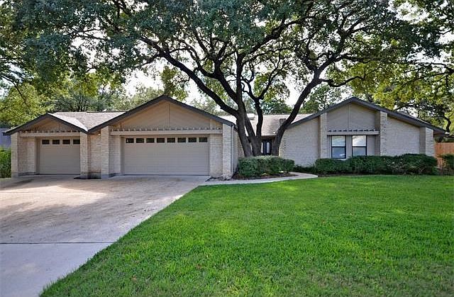 Front 3 Car Garage and beautiful Landscaping