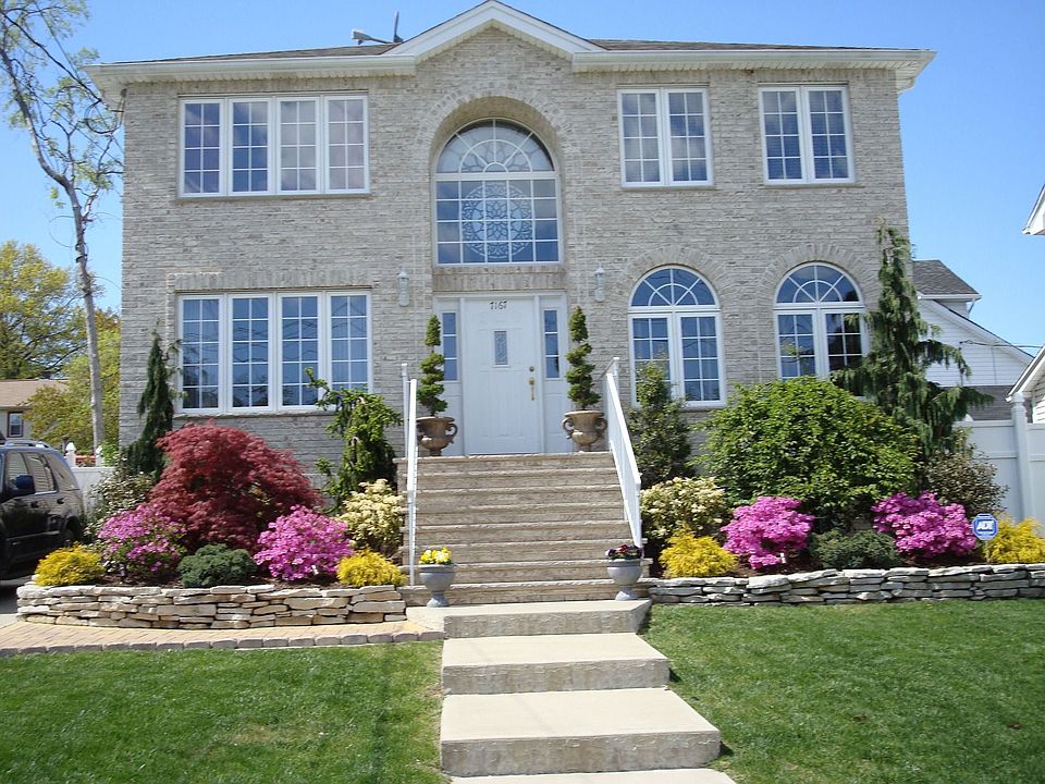 All Brick Front Center Hall Colonial